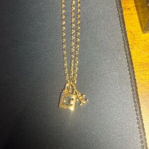 Celine Gold-tone padlock and key charm pendant necklace